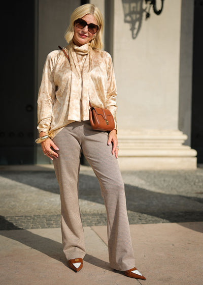 Silk blouse with a champaign flap