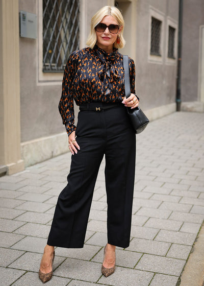 Fashionista black silk blouse with a flap