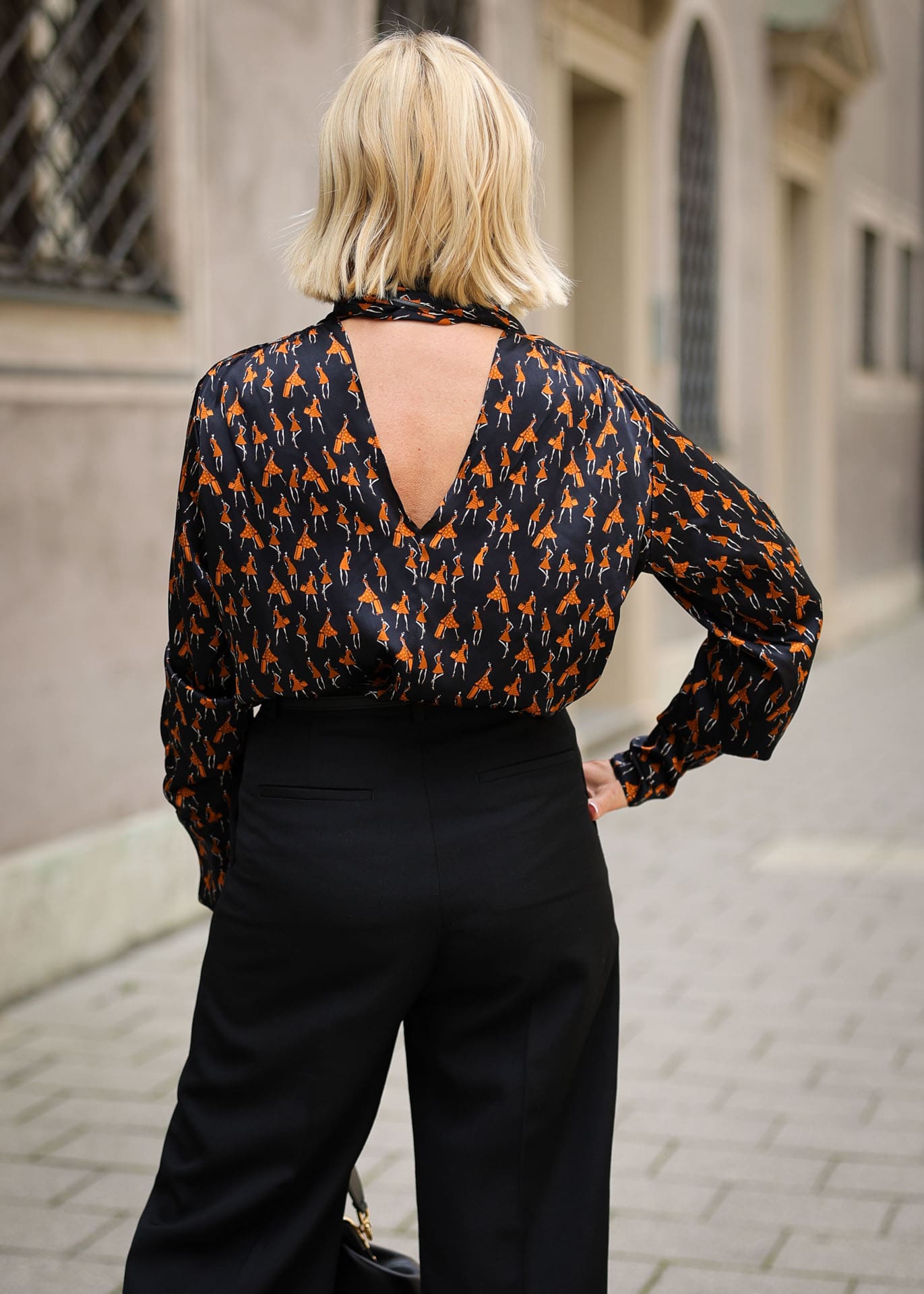 Fashionista black silk blouse with a flap